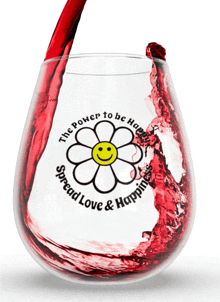 a glass with a smiley face and the words " the power to be happy spread love & happiness "