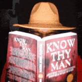 a man in a hat reads a book titled know thy man