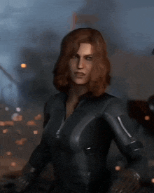 a woman in a black suit with a zipper on the front