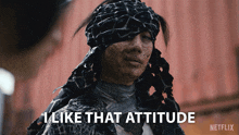 a woman with a bandana on her head says i like that attitude on a netflix screen