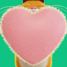 a cartoon cat with a pink heart in his mouth