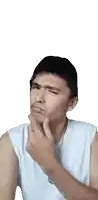 a man wearing a white tank top is making a funny face