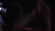 a close up of a person 's mouth with a mask on .