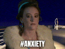 a woman in a fur coat says #anxiety in a pixelated image