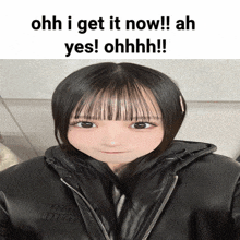 a girl in a black jacket with the words ohh i get it now