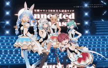 a group of anime girls are standing on a stage with the words connected written above them