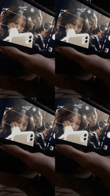 a person is taking a picture of a girl with a cell phone