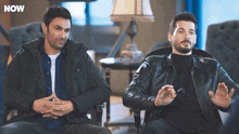 two men sitting next to each other with the word now on the bottom right