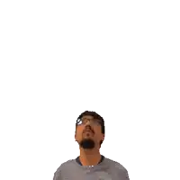 a man blowing out a star with the number 14 behind him