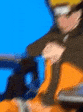 a blurry picture of a person wearing a naruto costume .
